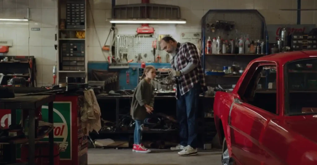 A Garage Owner Standing on A Epoxy Coated Floor